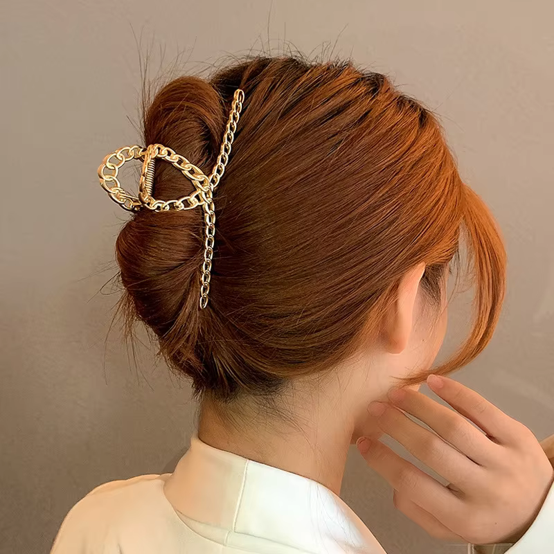 קליפ שיער מתכת גיאומטרי · ORA STYLE — איכות נבחרת · משלוח לכל הארץ